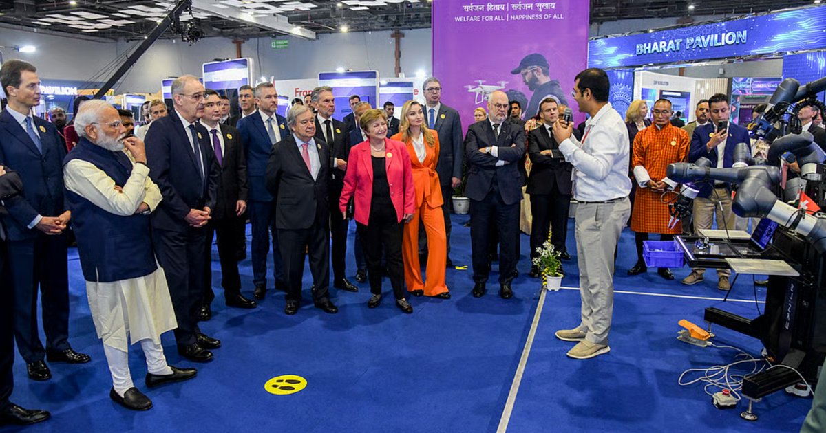 Leaders from over 85 countries at the AI Impact Summit in New Delhi adopting the New Delhi Declaration calling for human centered artificial intelligence and global cooperation