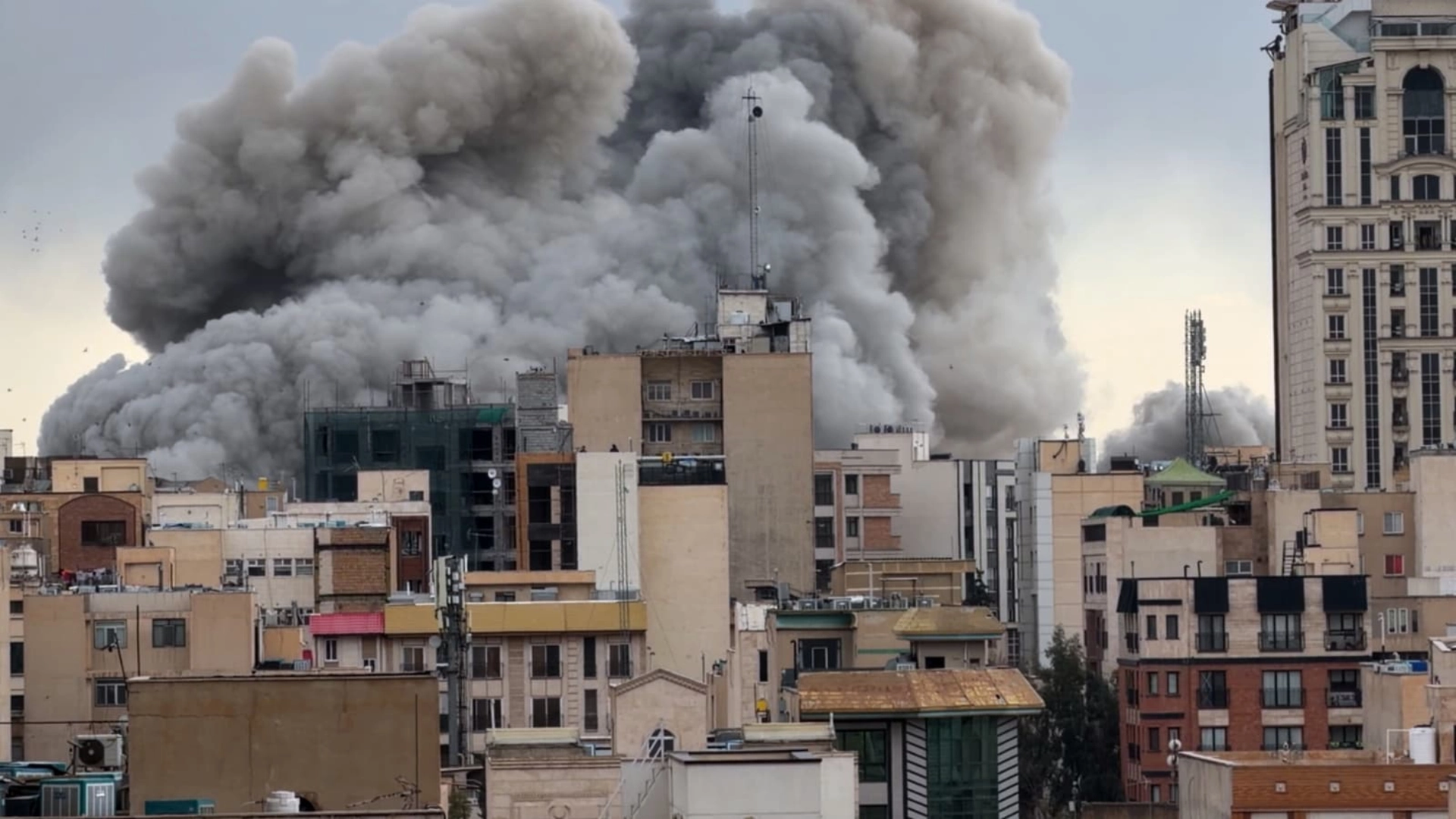 Smoke rises over Tehran after Israeli and US airstrikes as Iran closes the Strait of Hormuz and drones hit the US Embassy in Riyadh