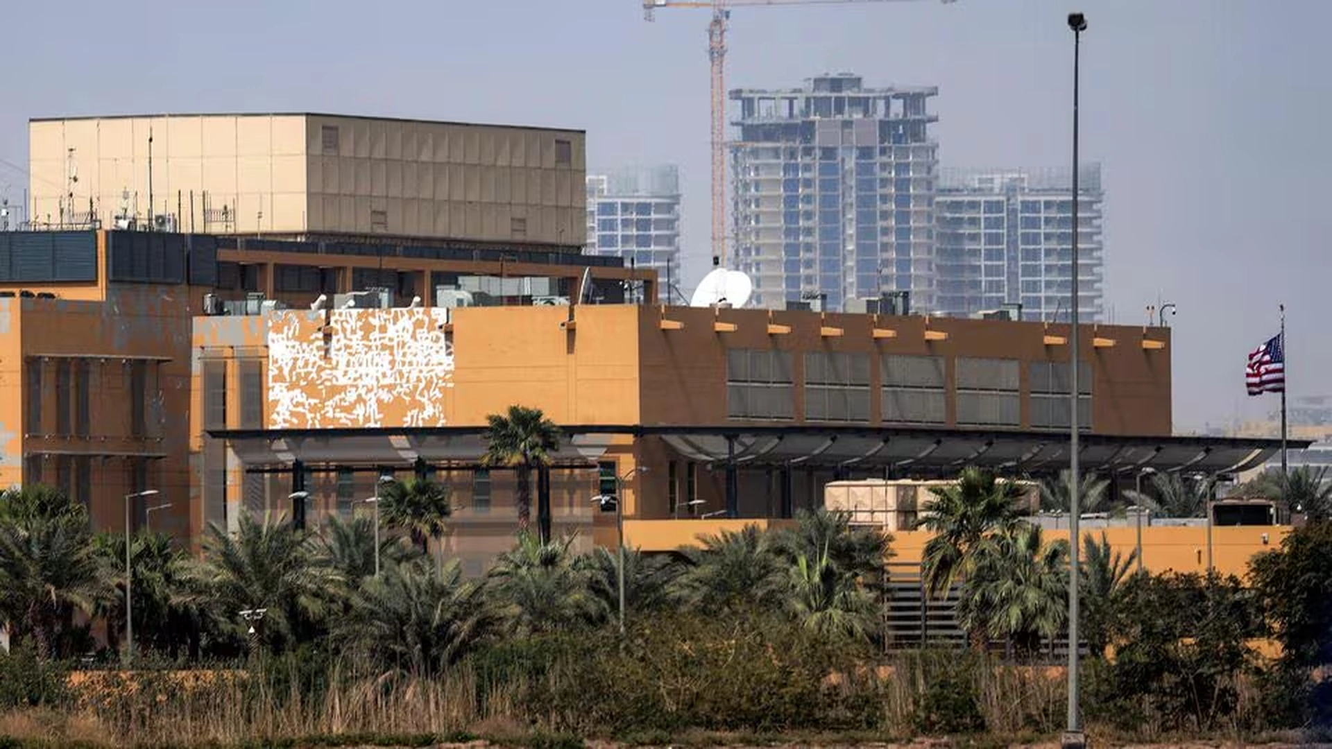 Smoke rising after attack on the U.S. Embassy compound in Baghdad during escalating Iran war conflict
