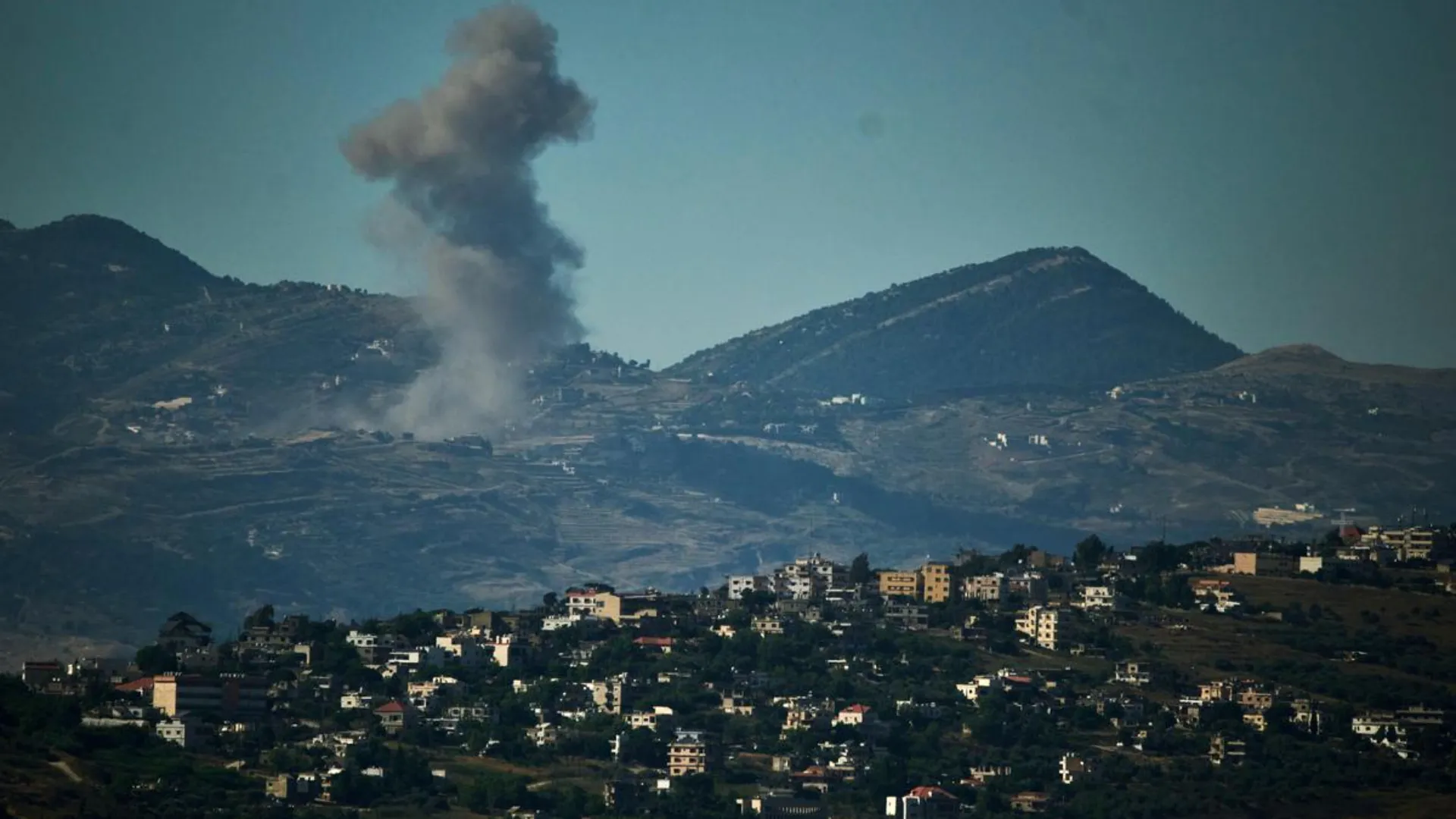 Smoke rising over southern Lebanon after an Israeli airstrike, as the Israel-Hezbollah ceasefire faces violations and renewed fighting.
