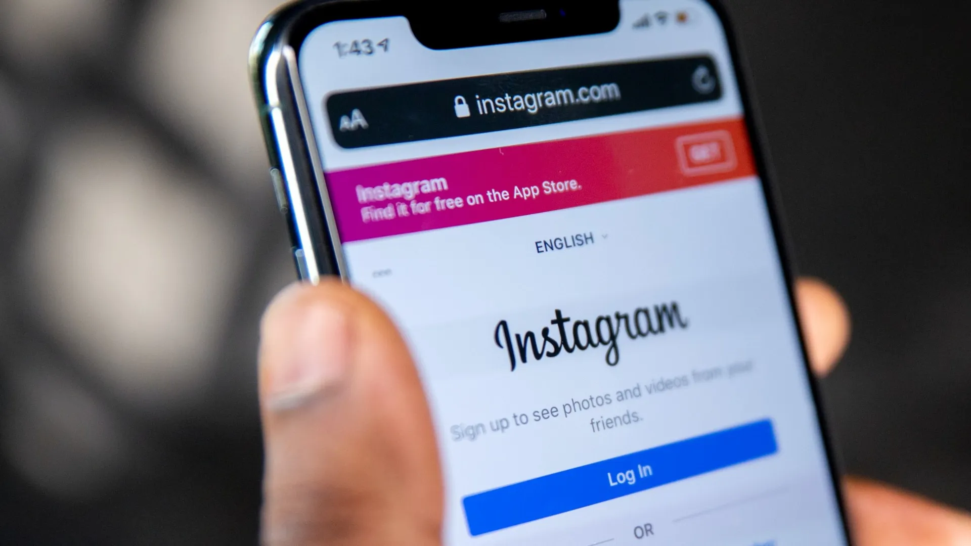Smartphone displaying Instagram app as Meta discontinues end to end encrypted direct messages globally amid privacy and online safety concerns