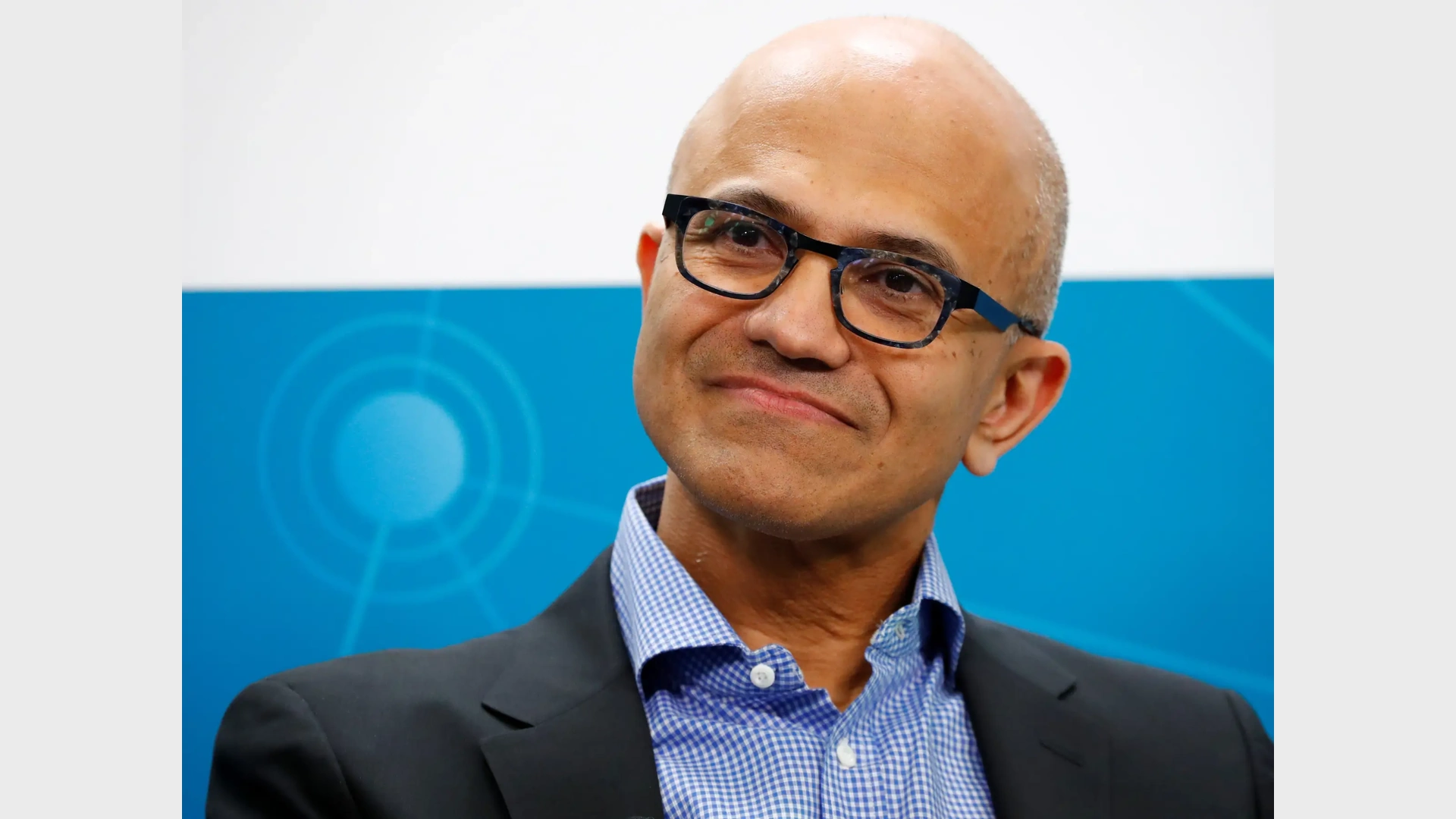 Microsoft CEO Satya Nadella discusses AI agents as digital workers needing software licenses and secure cloud systems for enterprise businesses