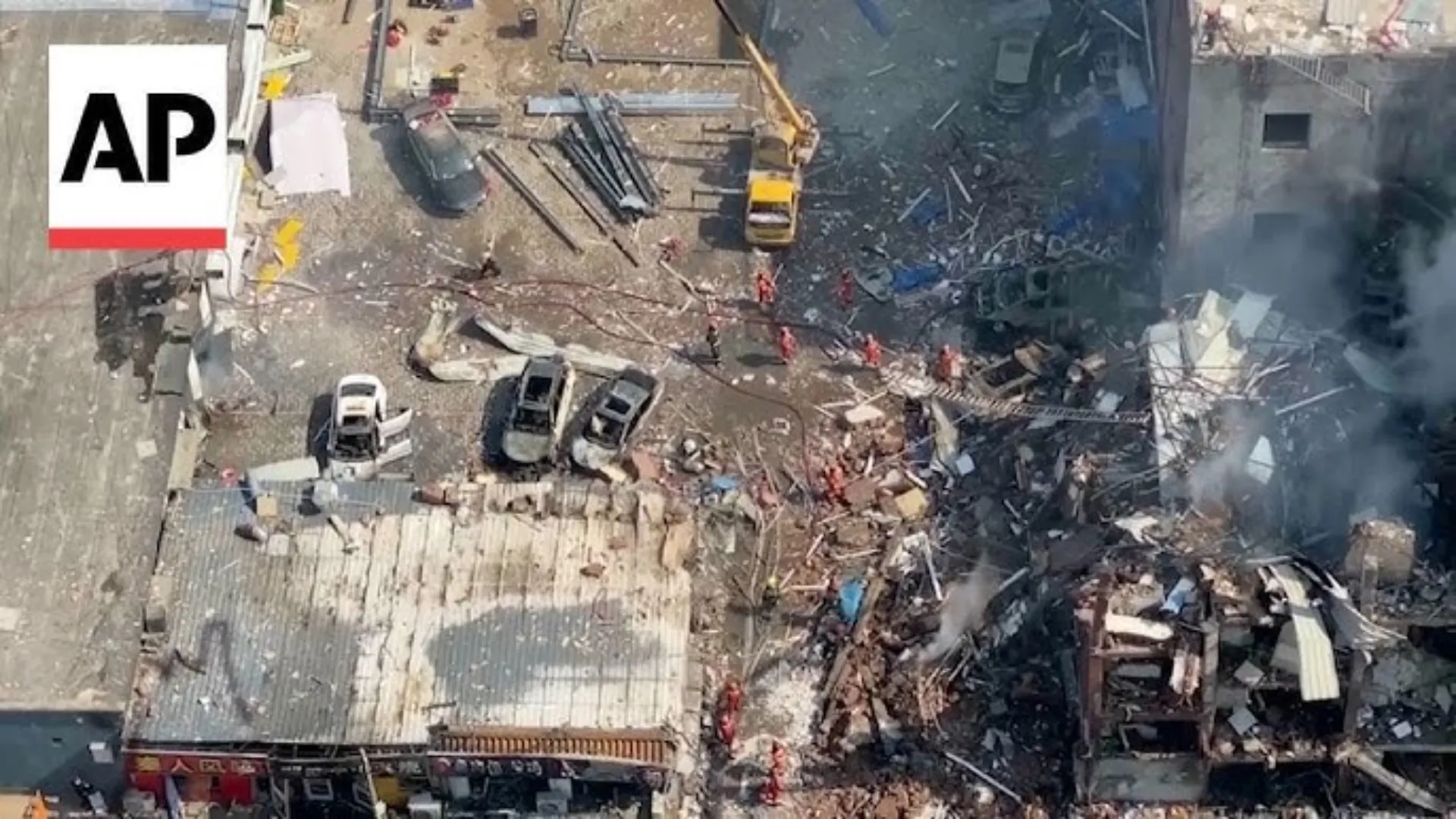 Smoke and debris falling from CITIC Tower, also known as China Zun, Beijing's tallest 109-storey skyscraper, after a Sunward SA 60L Aurora light aircraft crashed into the building on June 26, 2026.