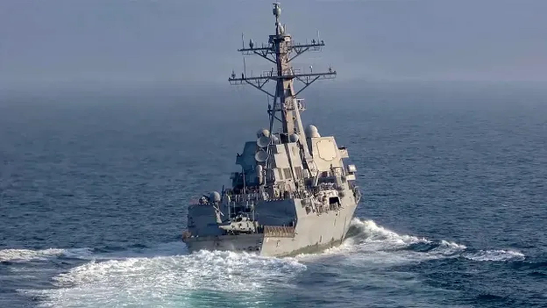 US Navy warship intercepts Iranian flagged cargo ship Touska near Strait of Hormuz as regional tensions rise between the United States and Iran